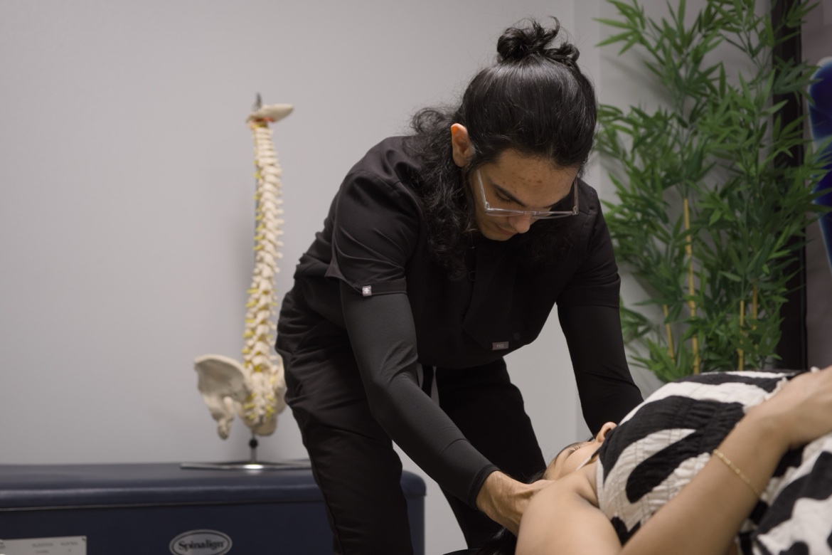Max Chiropractic clinician providing focused shoulder care
